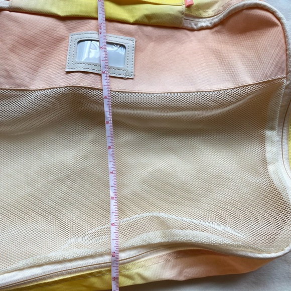 Calpak Peach and Yellow Mesh Travel Bag - Picture 11 of 11
